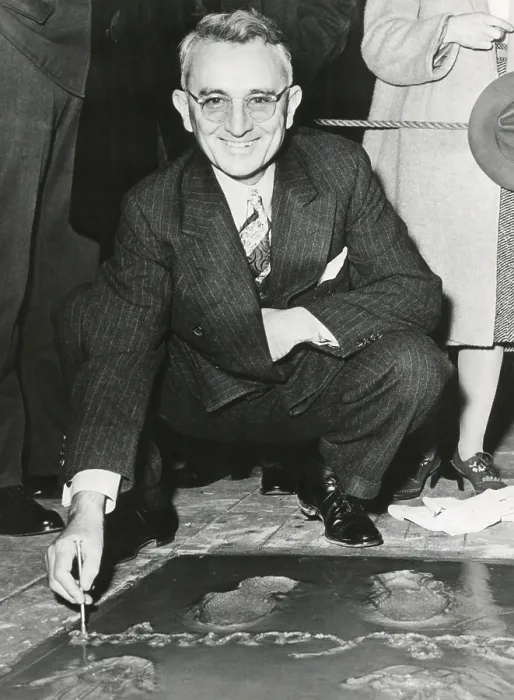 Framed Print : Dale Carnegie, signing his concrete slab at Grauman's Chinese Theatre