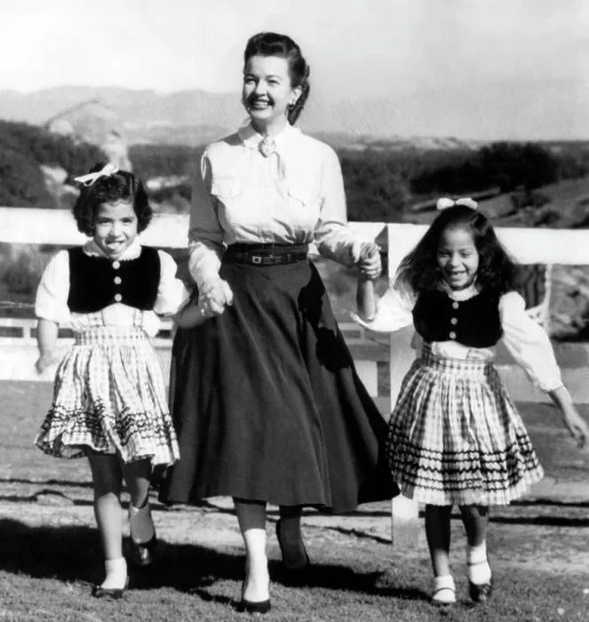 Framed Print : Dale Evans (center), with her two adopted daughters, Deborah Lee (left), Merry Doe (right), circa 1959. Courtesy: CSU Archives / Everett Collection