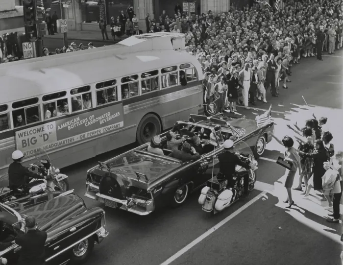 Framed Print : Dallas crowds waving as President Kennedy's limousine drives through downtown Dallas