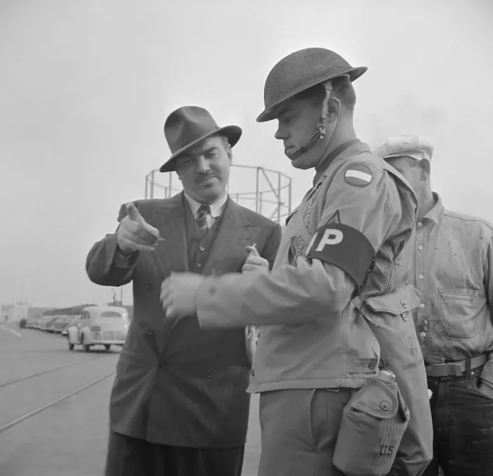 Framed Print : Day after Pearl Harbor attack in San Francisco. Military police checks IDs at transport dock. Dec. 8, 1941. (BSLOC_2013_11_155)