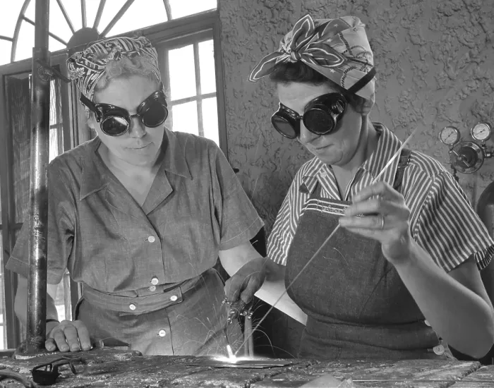 Framed Print : Two Daytona Beach, Florida, housewives welding in an Aircraft construction class during World War II. Both have sons in the military. April 1942