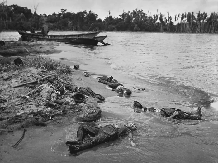 Framed Print : Dead Japanese soldiers and their destroyed landing boat on the beach of Buna Mission. New Guinea. March 1943. (BSLOC_2013-12_181) Framed Print : Dead Japanese soldiers and their destroyed landing boat on the beach of Buna Mission. New Guinea. March 1943. (BSLOC_2013-12_181)