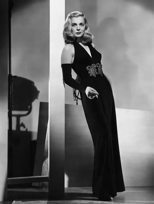 Framed Print : DEAD RECKONING, Lizabeth Scott, modeling a gown by Jean Louis, 1947