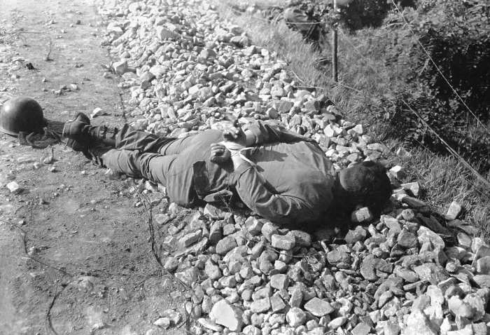 Framed Print : Dead U.S. soldier shot thru the head with his hands tied behind his back. He was one of four captured and executed by North Koreans on the night of July 9, 1950 Framed Print : Dead U.S. soldier shot thru the head with his hands tied behind his back. He was one of four captured and executed by North Koreans on the night of July 9, 1950