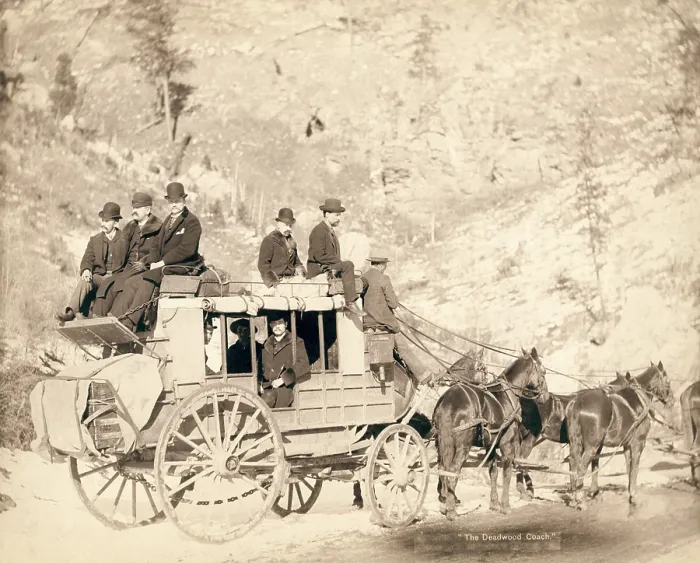 Framed Print : The Deadwood stagecoach fully loaded with nine formally dressed men sitting in and on top of coach, ca. 1885 Framed Print : The Deadwood stagecoach fully loaded with nine formally dressed men sitting in and on top of coach, ca. 1885