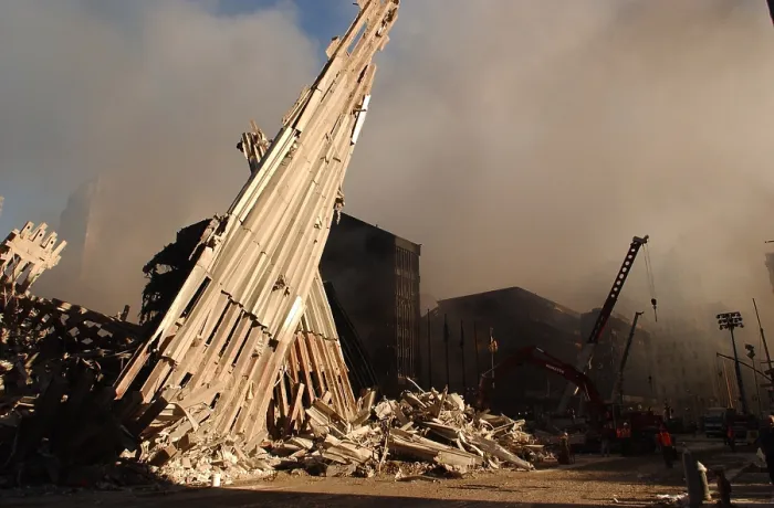 Framed Print : Debris from the WTC 2, the South Tower along Church St. on Sept. 13, 2001. The black buildings in the background are WTC 4 and WTC 5