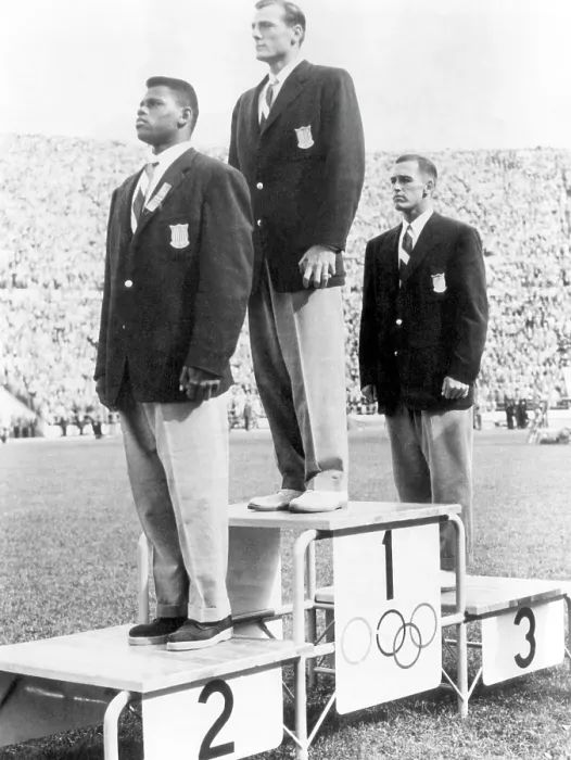Framed Print : Decathlete Bob Mathias (center), receiving first place gold medal at the Olympics, Helsinki, Finland, 1952.. Courtesy: CSU Archives  /  Everett Collection