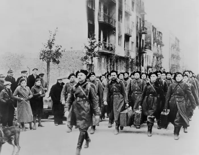 Framed Print : Defeated Polish soldiers march out of Warsaw to a prison camp after defeat by German invaders. Polish civilians watch the sad parade. World War 2, ca. Sept-Oct. 1940
