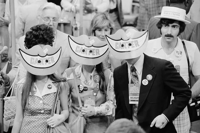 Framed Print : Delegates wearing Jimmy Carter smile masks at the Democratic National Convention New York City. July 15 1976 Framed Print : Delegates wearing Jimmy Carter smile masks at the Democratic National Convention New York City. July 15 1976