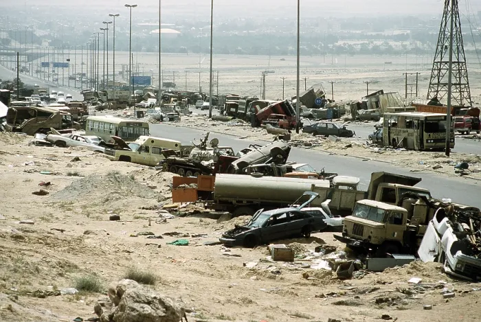 Framed Print : Demolished vehicles line Highway 80 the Highway of Death were destroyed as Iraqi forces retreated from Kuwait during Operation Desert Storm