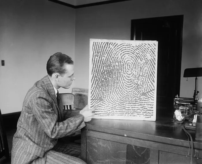 Framed Print : Demonstration of a fingerprint reconstructed from a verbal description received by telephone or telegraph, Jan. 13, 1930. (BSLOC_2013_8_157)