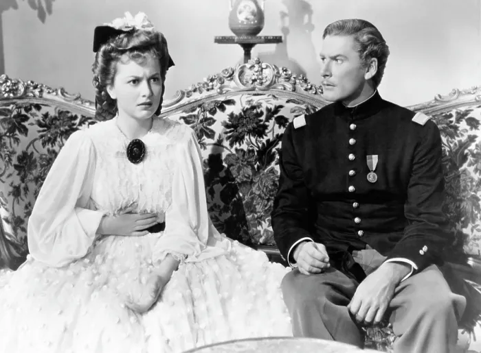 Framed Print : THEY DIED WITH THEIR BOOTS ON, from left: Olivia de Havilland, Errol Flynn as George Armstrong Custer, 1941 Framed Print : THEY DIED WITH THEIR BOOTS ON, from left: Olivia de Havilland, Errol Flynn as George Armstrong Custer, 1941