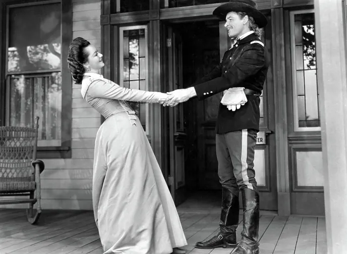Framed Print : THEY DIED WITH THEIR BOOTS ON, Olivia de Havilland, Errol Flynn, 1941