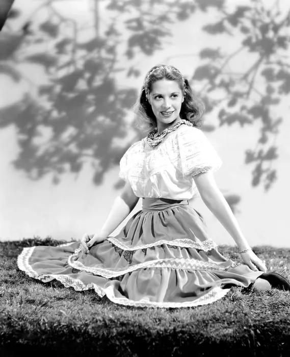 Framed Print : Dinah Shore wearing peasant blouse and skirt, ca. 1944 Framed Print : Dinah Shore wearing peasant blouse and skirt, ca. 1944