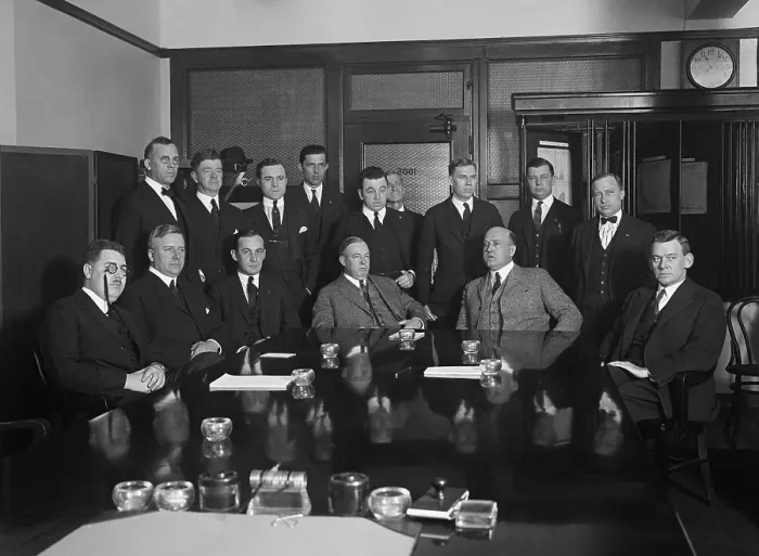 Framed Print : Director Charles R. Forbes, of the U.S. Veterans Bureau holding a conference with his staff. Forbes is seated center left in grey suit. Ca. Jan-Feb 1923 Framed Print : Director Charles R. Forbes, of the U.S. Veterans Bureau holding a conference with his staff. Forbes is seated center left in grey suit. Ca. Jan-Feb 1923