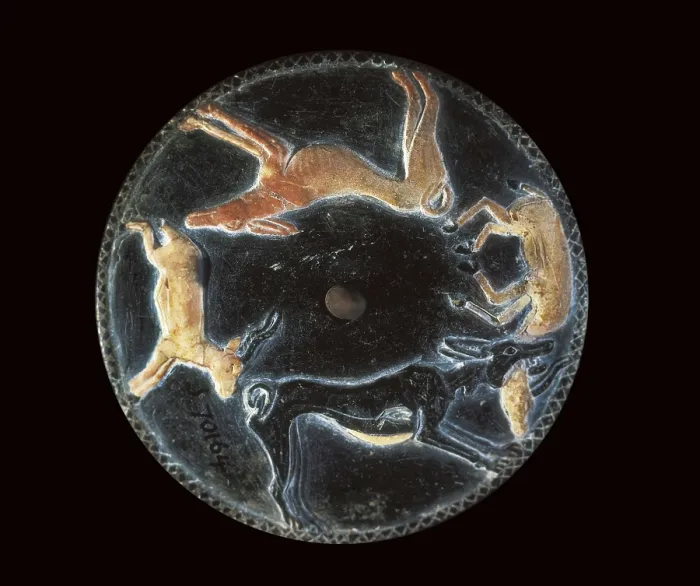 Framed Print : Disk with dogs chasing a gazelle. 33rd-31st c. BC. The tomb of this officer from the 1st Dynasty, during the kingdom of Den, contained several disks. Egyptian art. Thinite period