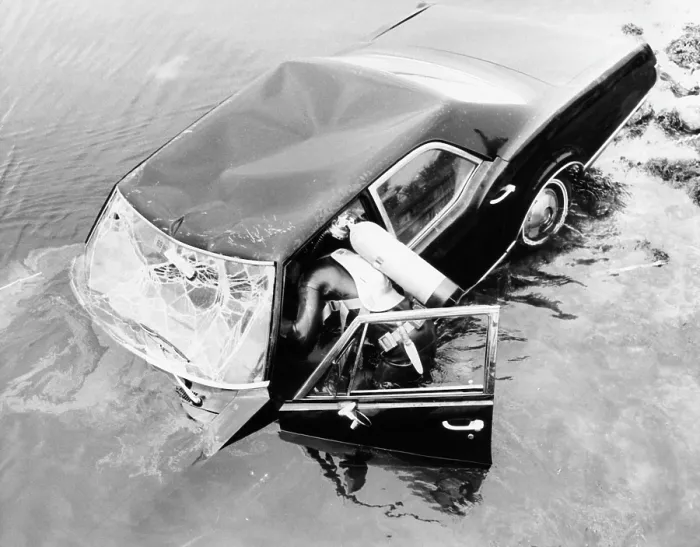 Framed Print : Diver investigating Edward Kennedy's 1967 Oldsmobile in Willamette River after July 18, 1969, accident that killed Mary Jo Kopechne, Courtesy: CSU Archives / Everett Collection