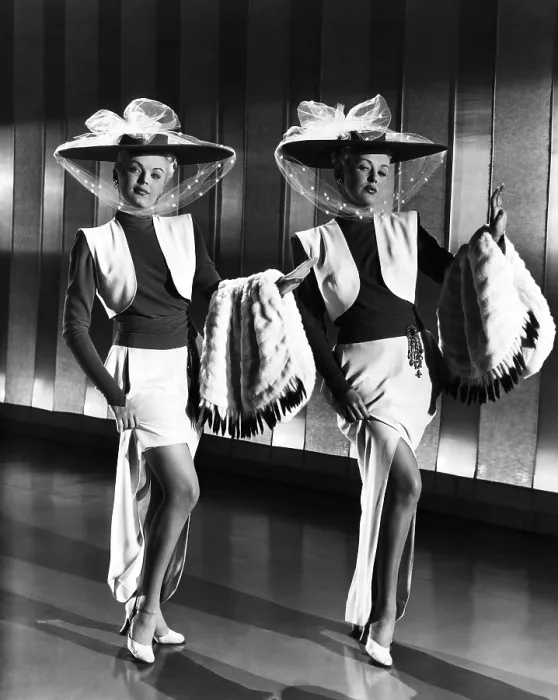 Framed Print : THE DOLLY SISTERS, June Haver, Betty Grable, (in costumes by Orry-Kelly), 1945, TM and copyright 20th Century Fox Film Corp. All rights reserved / Courtesy: Everett Collection Framed Print : THE DOLLY SISTERS, June Haver, Betty Grable, (in costumes by Orry-Kelly), 1945, TM and copyright 20th Century Fox Film Corp. All rights reserved / Courtesy: Everett Collection