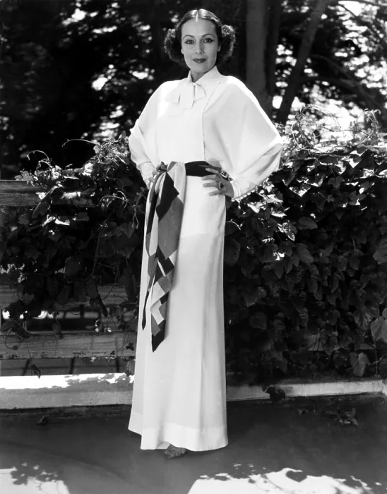 Framed Print : Dolores del Rio, modeling hostess pajamas of white crepe with a hand-dyed belt, 1935 Framed Print : Dolores del Rio, modeling hostess pajamas of white crepe with a hand-dyed belt, 1935
