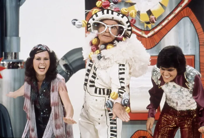 Framed Print : DONNY AND MARY, from left: Marie Osmond, Bob Hope (as Elton John), Donny Osmond, (Season 1, pilot episode, aired Novembe 16, 1975), 1975-1979 Framed Print : DONNY AND MARY, from left: Marie Osmond, Bob Hope (as Elton John), Donny Osmond, (Season 1, pilot episode, aired Novembe 16, 1975), 1975-1979