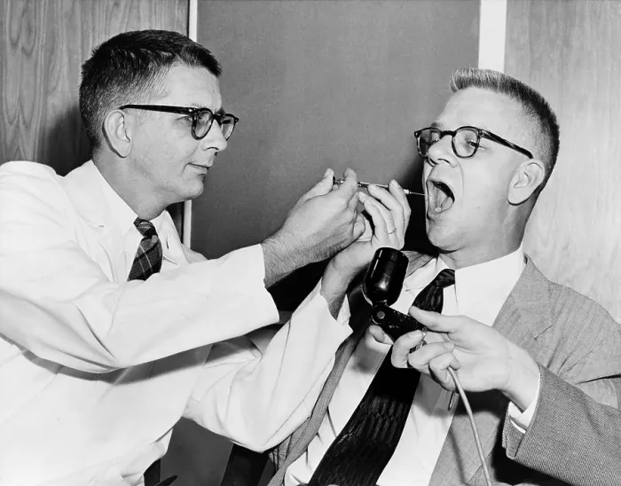 Framed Print : Dr. Harry L. Williams squirts LSD from a syringe into the mouth of Carl Curt Pfeiffer, M.D. Ph.D. (1908-1988) at Emory University in Atlanta, Georgia, 1955. Dr Framed Print : Dr. Harry L. Williams squirts LSD from a syringe into the mouth of Carl Curt Pfeiffer, M.D. Ph.D. (1908-1988) at Emory University in Atlanta, Georgia, 1955. Dr