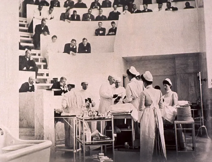 Framed Print : Dr. Harvey Cushing with William Halsted and Hugh Young in the operating theater with an audience of physicians and students, at John Hopkins University, ca. 1910