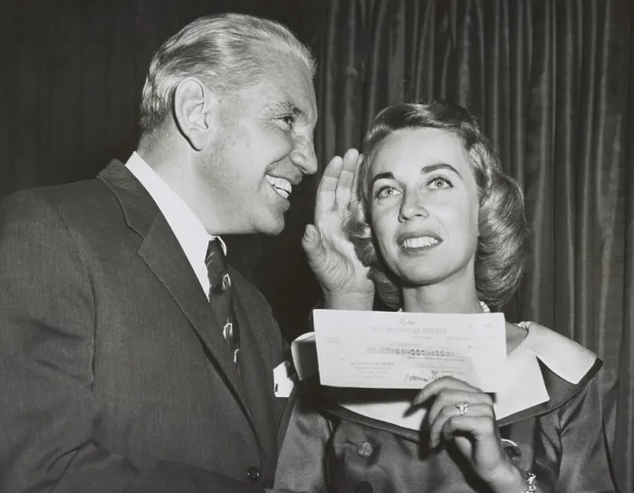 Framed Print : Dr. Joyce Brothers holds her check for correctly answering the $64, 000 Question