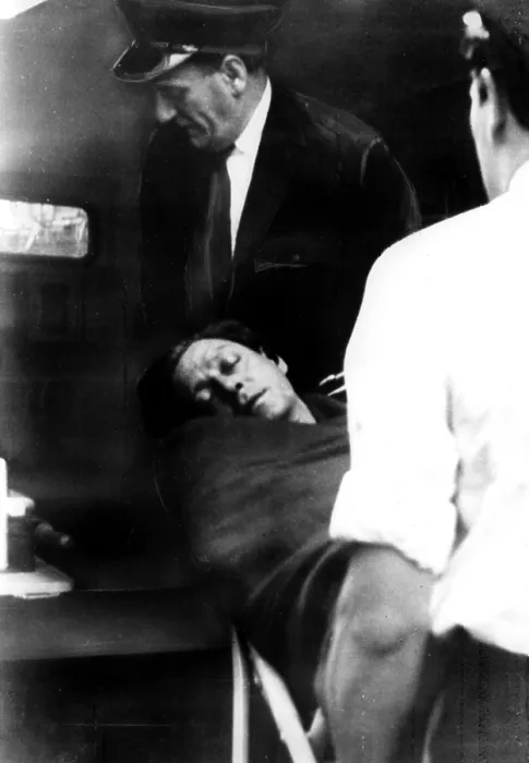 Framed Print : Dr. Stephen Ward being carried from his home to an ambulance after taking an overdose of drugs, just hours before jury deliberations were to begin on vice charges against him