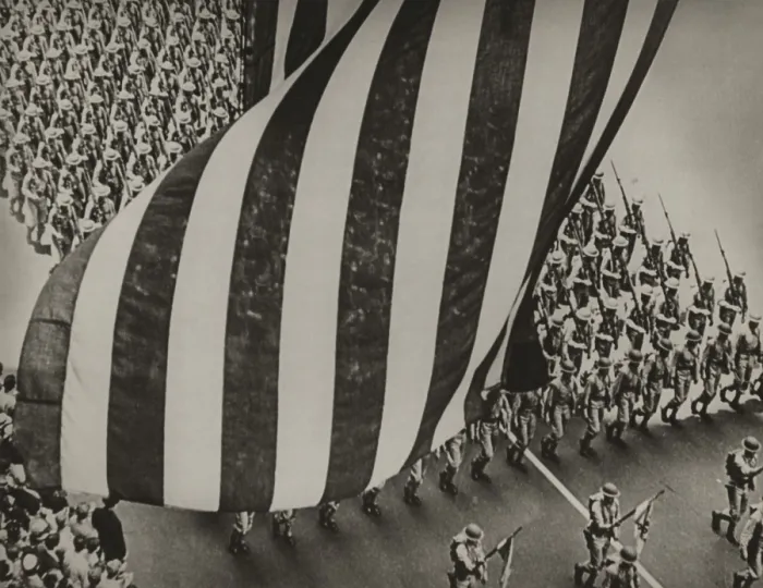 Framed Print : Dramatic photo of US flag and uniformed soldiers carrying rifles with bayonets fixed, marching in a parade during national mobilization in 1942 Framed Print : Dramatic photo of US flag and uniformed soldiers carrying rifles with bayonets fixed, marching in a parade during national mobilization in 1942