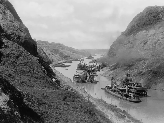 Framed Print : Dredges and cleaning up after one of the frequent landslides in the Culebra Cut, c. 1912-1914