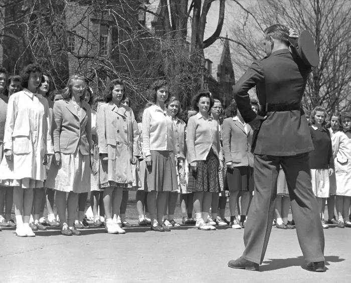 Framed Print : Drill Instructor looks over new arrivals to Marine Corps Women's Reserve Officer's Candidate School. Ca.1945. (BSLOC_2015_14_115)