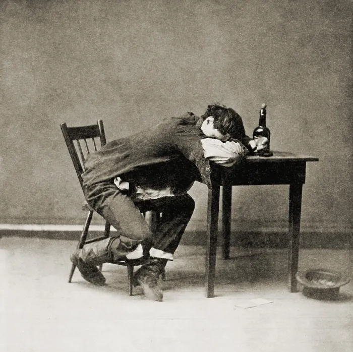 Framed Print : Drunk man with his head on table, 1874. He is cleaned out and at the sad end of the drinker's progress (BSLOC_2018_2_113)