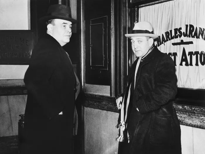 Framed Print : Dutch Schultz (right) and James L. Nooman, his attorney, visit the Dist. Atty. of Troy, New York