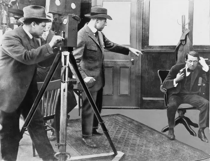 Framed Print : D.W. Griffith (1875-1948) directing Henry B. Walthall in 1914 film THE AVENGING CONSCIENCE with Billy Bitzer at the camera. ra. ra. ra
