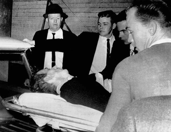 Framed Print : Dying assassin Lee Harvey Oswald is placed in ambulance after he was shot by Jack Ruby, in the Dallas Police Station Framed Print : Dying assassin Lee Harvey Oswald is placed in ambulance after he was shot by Jack Ruby, in the Dallas Police Station