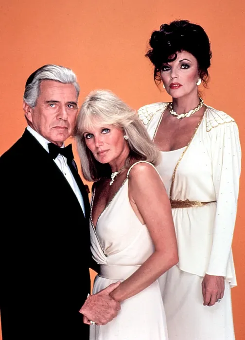 Framed Print : DYNASTY, John Forsythe, Linda Evans and Joan Collins as Blake Carrington, Krystle Carrington and Alexis Carrington-Colby, 1981-1989 Framed Print : DYNASTY, John Forsythe, Linda Evans and Joan Collins as Blake Carrington, Krystle Carrington and Alexis Carrington-Colby, 1981-1989