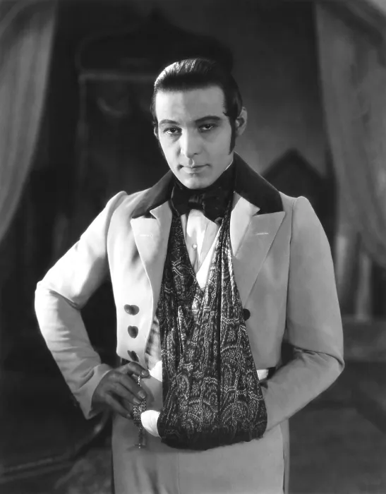 Framed Print : THE EAGLE, Rudolph Valentino, on-set with his arm in a sling after an automobile accident, 1925 Framed Print : THE EAGLE, Rudolph Valentino, on-set with his arm in a sling after an automobile accident, 1925