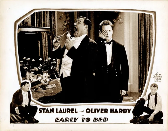 Framed Print : EARLY TO BED, lobbycard, Oliver Hardy (inset left and bottom left), Stan Laurel (inset right and bottom right), 1928 Framed Print : EARLY TO BED, lobbycard, Oliver Hardy (inset left and bottom left), Stan Laurel (inset right and bottom right), 1928
