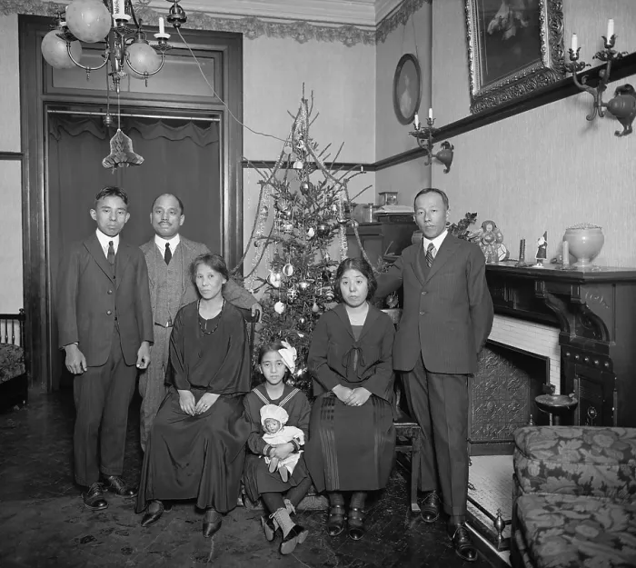 Framed Print : East Asian family with Christmas tree in their home in Washington, D.C. in 1921-22. The well-dressed group are in a spacious nicely furnished apartment (BSLOC_2016_8_91)