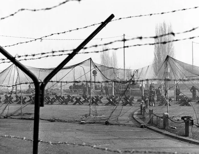 Framed Print : East Germany reinforces the concrete Berlin Wall. More barbed was strung on top of the wall Framed Print : East Germany reinforces the concrete Berlin Wall. More barbed was strung on top of the wall