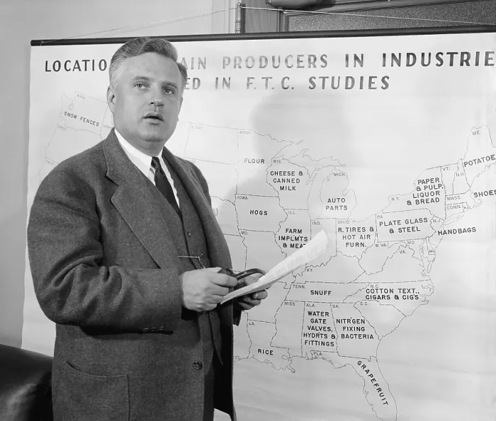 Framed Print : Economist Willis J. Ballinger with map showing state's industries, March 1939. (BSLOC_2013_7_126) Framed Print : Economist Willis J. Ballinger with map showing state's industries, March 1939. (BSLOC_2013_7_126)