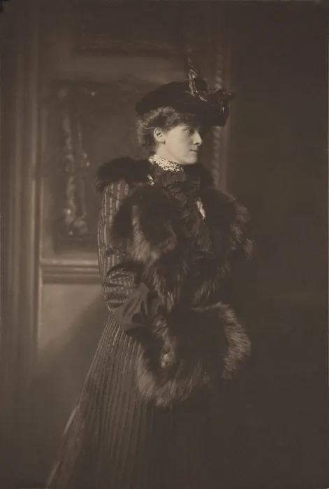 Framed Print : Edith Wharton, wears a feathered hat, a fur-trimmed coat, and a fur muff in Newport, Rhode Island, 1907