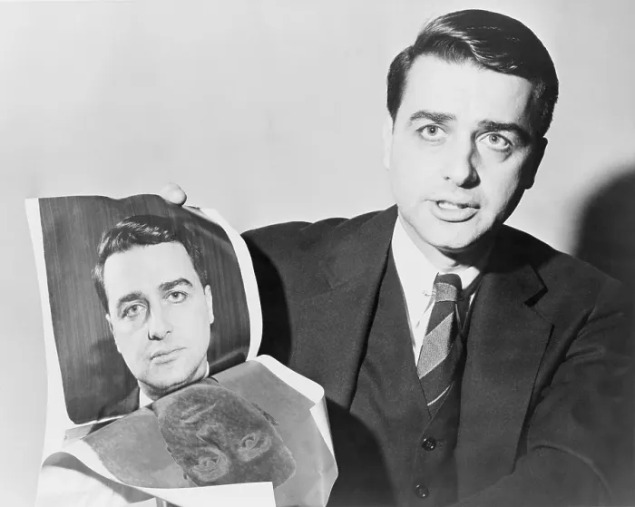 Framed Print : Edwin Herbert Land (1909-1991), American scientist and inventor, holding a polaroid photograph of himself, taken by the camera he invented