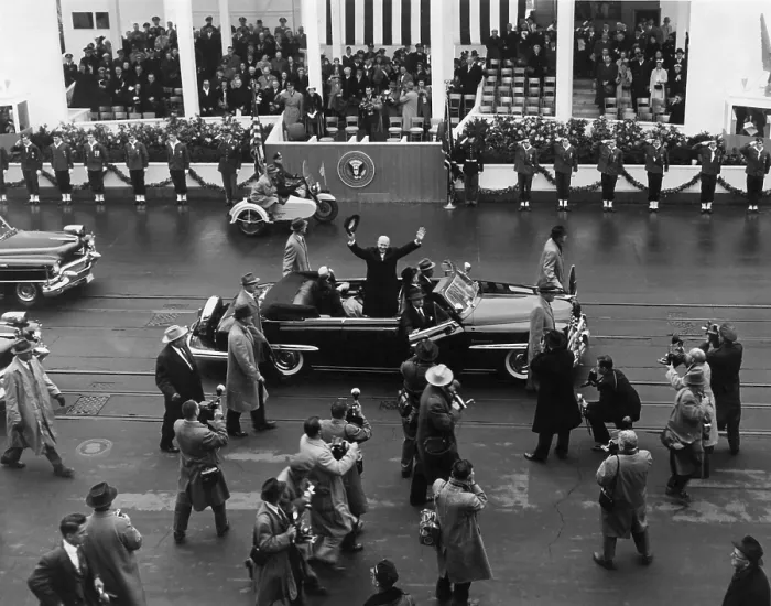 Framed Print : Eisenhower waves from an open car in the inaugural parade. Behind him is the White House Inaugural pavilion. Jan. 21, 1957. - (BSLOC_2014_16_36)