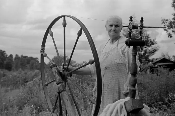 Framed Print : Elderly woman at her spinning wheel in the Ozark Mountains of Arkansas. August 1935 Framed Print : Elderly woman at her spinning wheel in the Ozark Mountains of Arkansas. August 1935