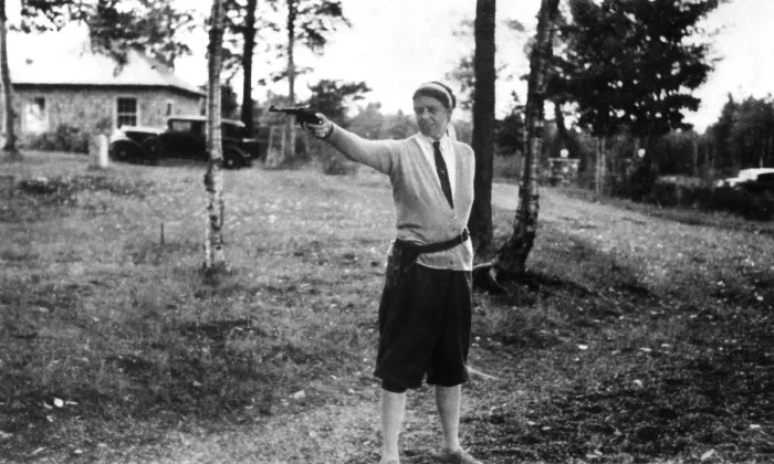 Framed Print : Eleanor Roosevelt at Chazy Lake, New York, firing hand gun. 1934. She was taught to shoot by her former body guard, Earl Miller. (BSLOC_2013_5_209)