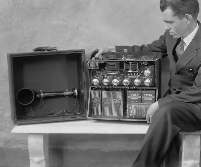 Framed Print : Electrical engineer, Brent Daniel, demonstrates his portable Super-Heterodyne radio. In 1925 he was able to receive Pacific Coast stations 3000 miles away