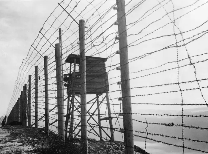 Framed Print : Electrified barbed wire fence and guard house at Struthof Concentration Camp near Natzweiler, France. The evacuated camp was discovered by the American Army, on Nov. 23, 1944 Framed Print : Electrified barbed wire fence and guard house at Struthof Concentration Camp near Natzweiler, France. The evacuated camp was discovered by the American Army, on Nov. 23, 1944