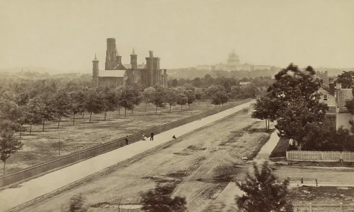 Framed Print : Elevated view of the Smithsonian Institution building in the near distance with the Capitol building in the background