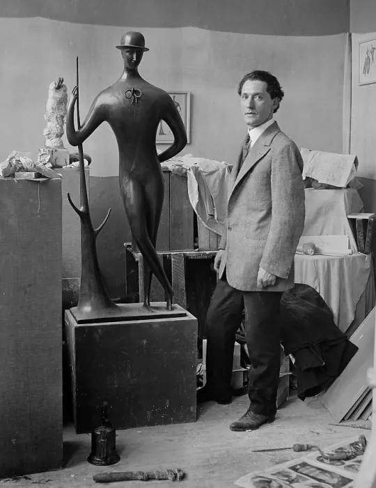 Framed Print : Elie Nadelman (1882-1946), Polish-born American sculptor in his studio with one of his best known works, MAN IN THE OPEN AIR, ca. 1915
